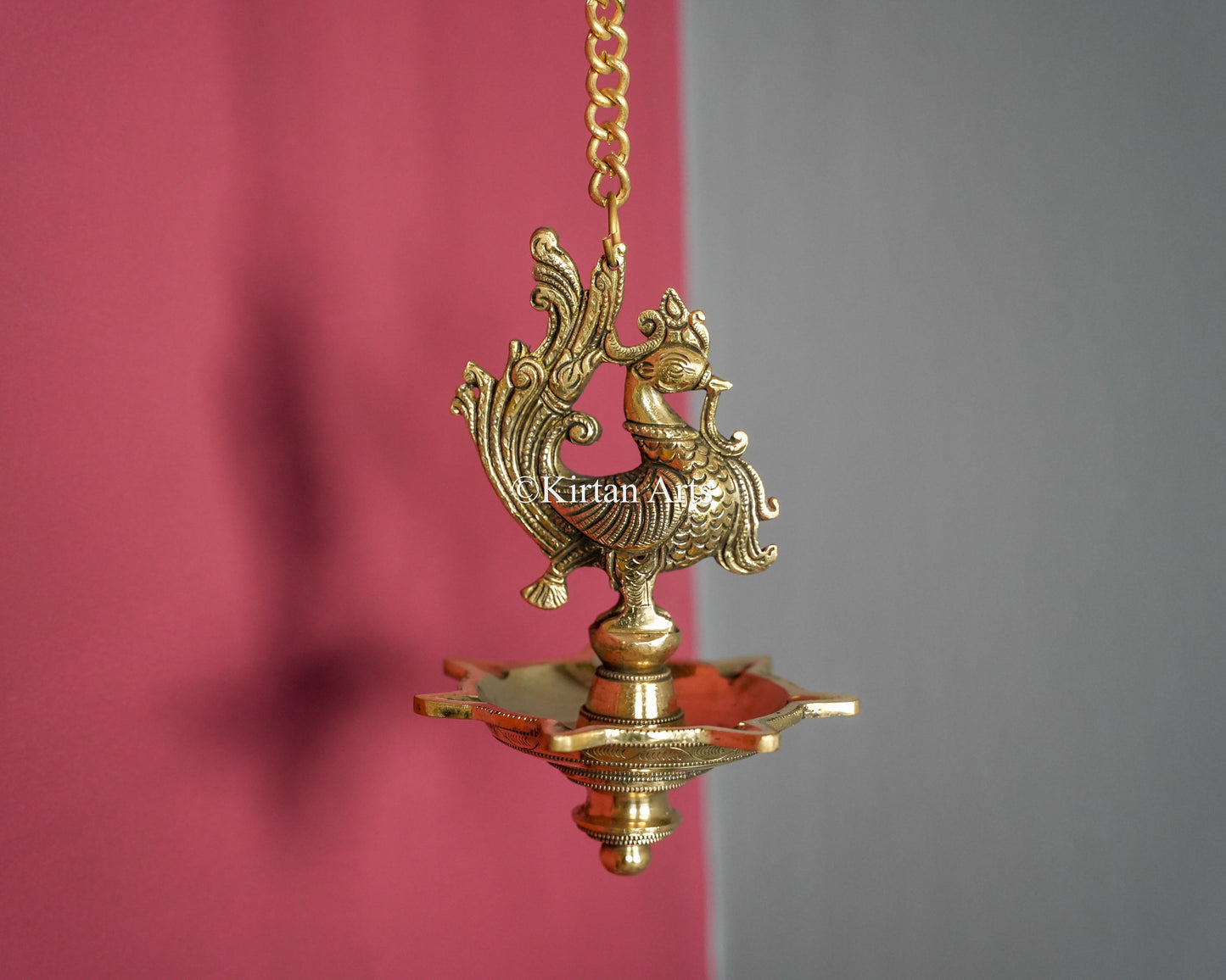 Premium Solid Brass Hanging Peacock Lamp (7 Wick) – 29-Inch Traditional Chain Diya with Carved Mayura