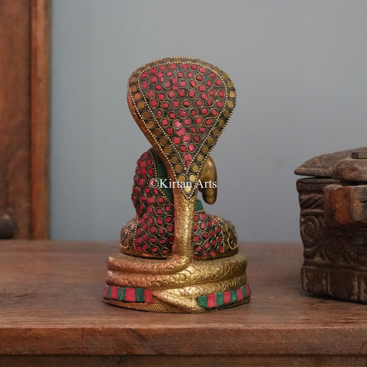 Brass Buddha Sheltered by the Serpent King's Hood