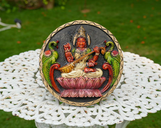 Hand-Carved Solid Wood Goddess Saraswati Circular Panel – 12-Inch Traditional Veena Saraswati Polychrome Wall Plaque