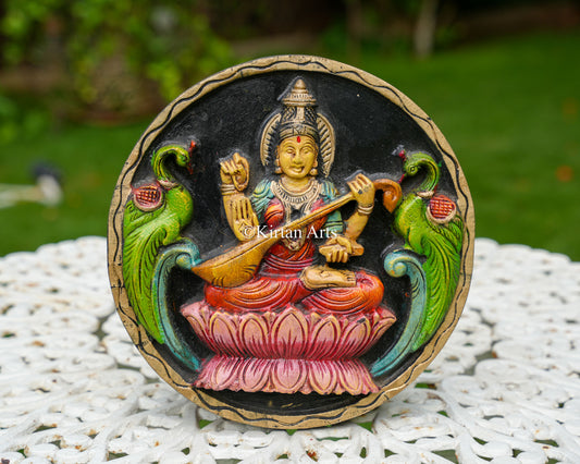Hand-Carved Solid Wood Goddess Saraswati Circular Panel – 12-Inch Traditional Veena Saraswati Polychrome Wall Plaque