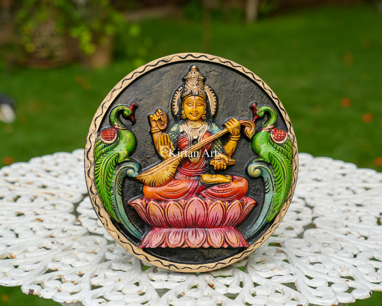 Hand-Carved Solid Wood Goddess Saraswati Circular Panel – 12-Inch Traditional Veena Saraswati Polychrome Wall Plaque