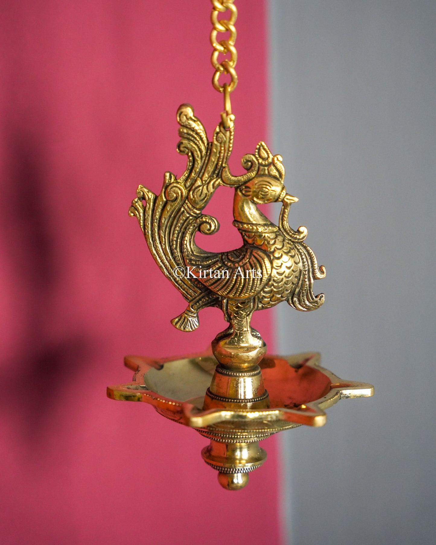 Premium Solid Brass Hanging Peacock Lamp (7 Wick) – 29-Inch Traditional Chain Diya with Carved Mayura